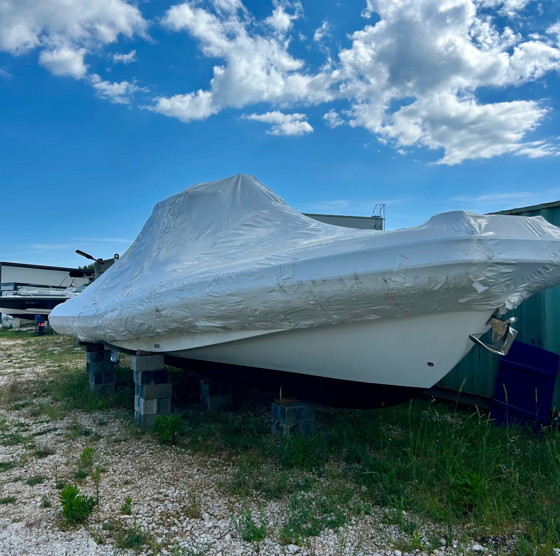 Wrapped boat on stands